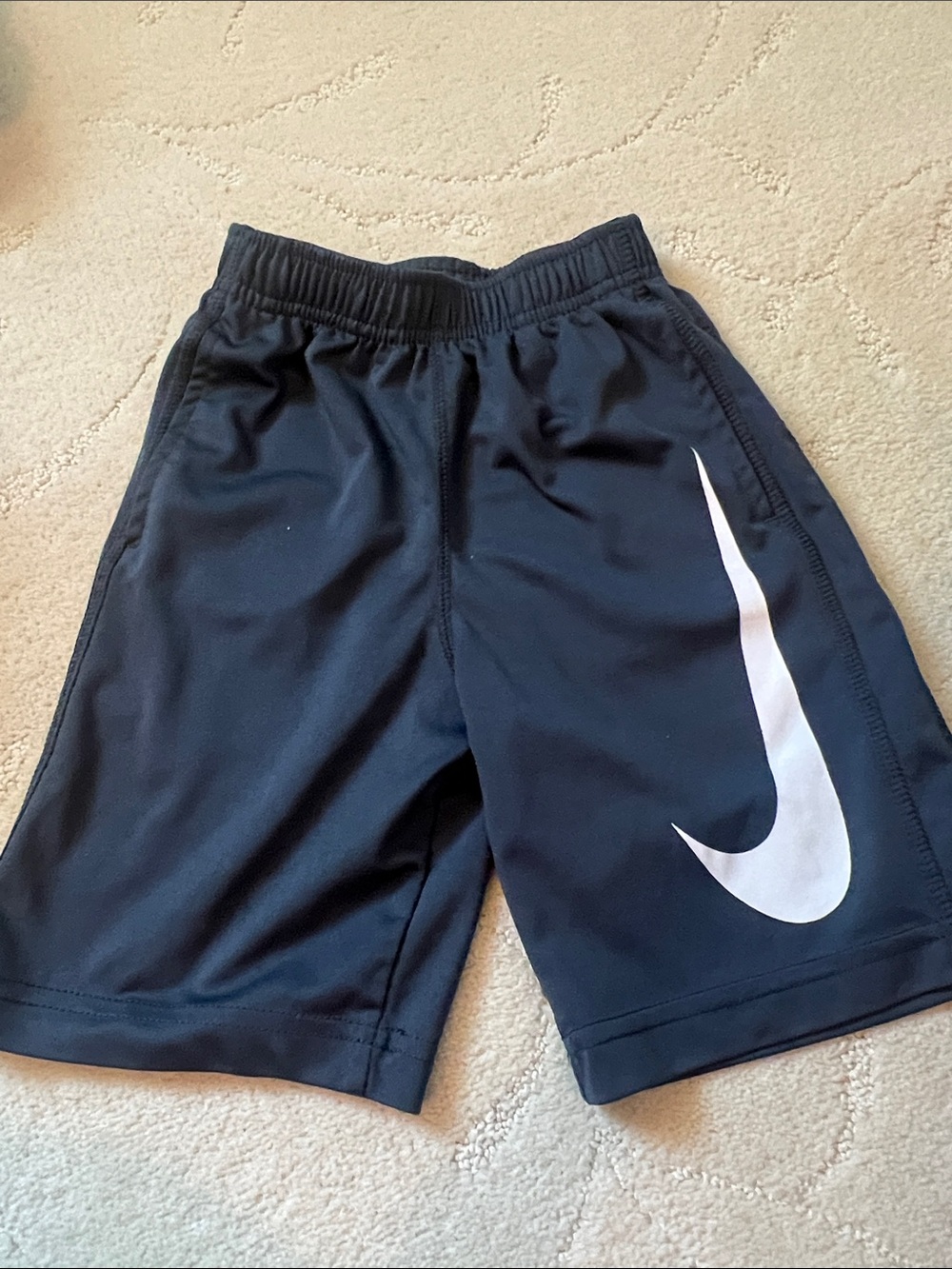 Nike Dark Grey Shorts with White Swoosh Logo